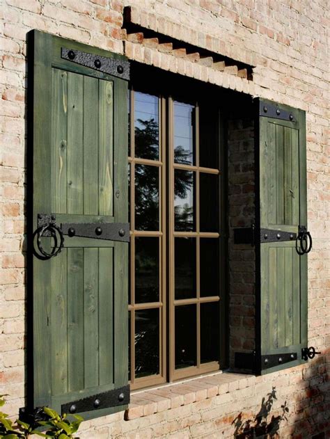 farmhouse wood shutters black metal face brackets|farmhouse distressed shutters.